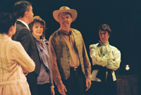 A woman in a white dress, a man in a suit, a woman in a lavender outfit, a man in a vest and cowboy hat,
       and a woman in a light green blouse